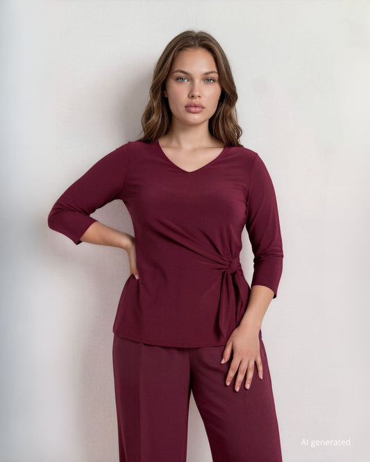 Maglia in jersey con nodo laterale che crea drappeggio curvy
