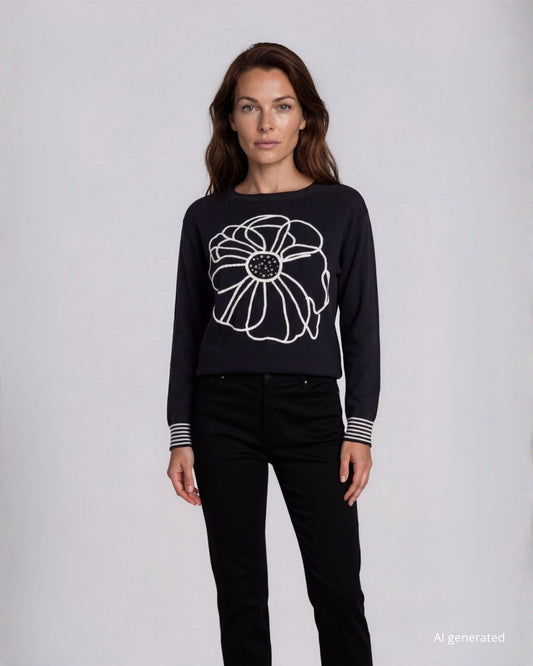 Maglia a pipistrello con fiore ricamato e bordi a contrasto