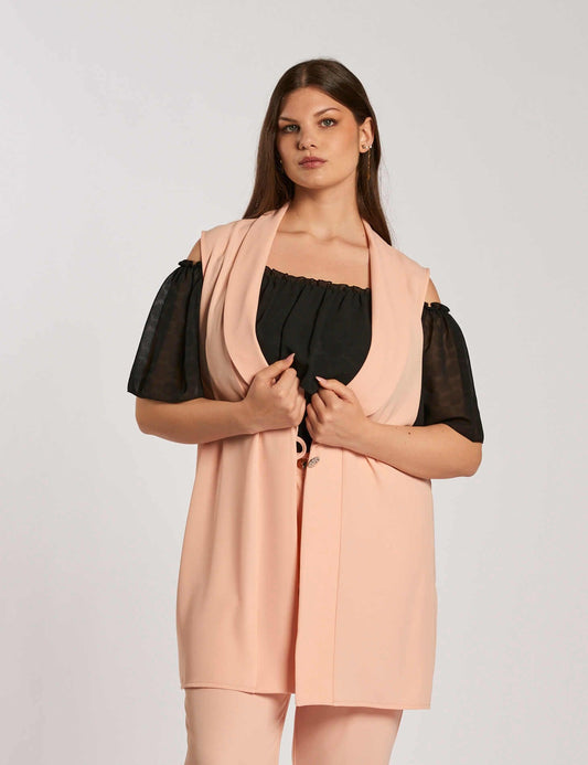 Gilet con scollo a scialle e bottone curvy