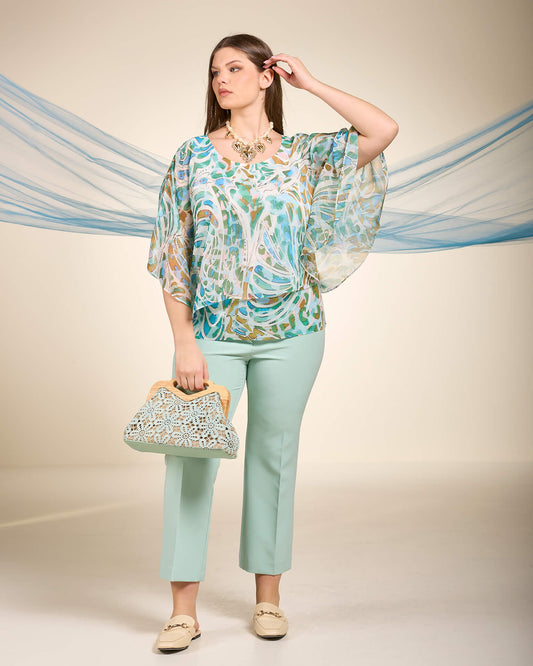 Poncho fantasia con fondo in paillettes curvy