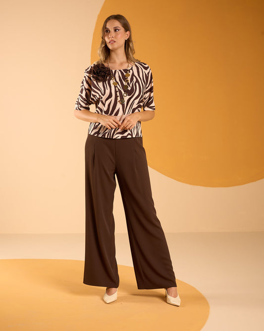 Casacca corta in crepe stampato animalier con abbassamento e maniche tre quarti
