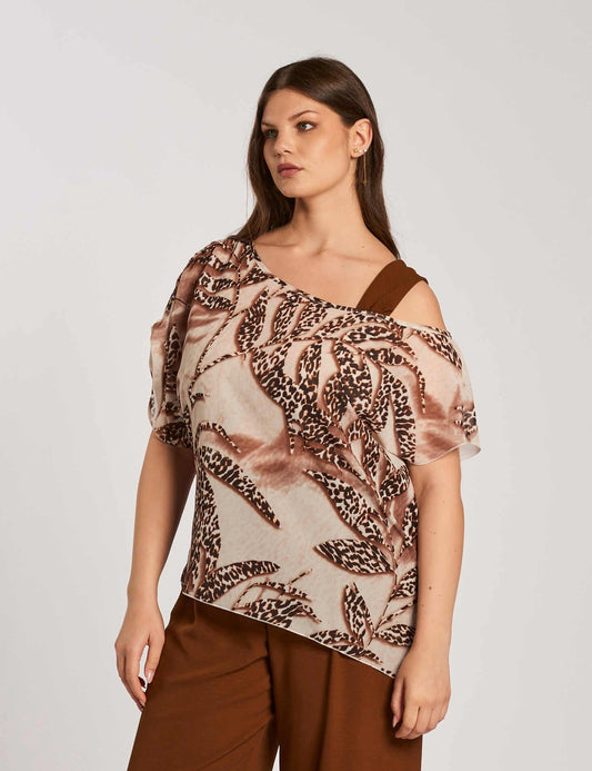 Casacca asimmetrica con punta e spallina curvy