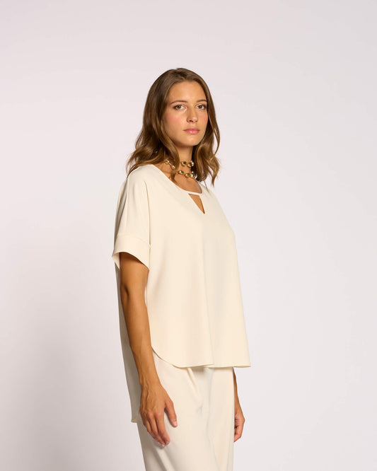 Casacca con oblò sullo scollo