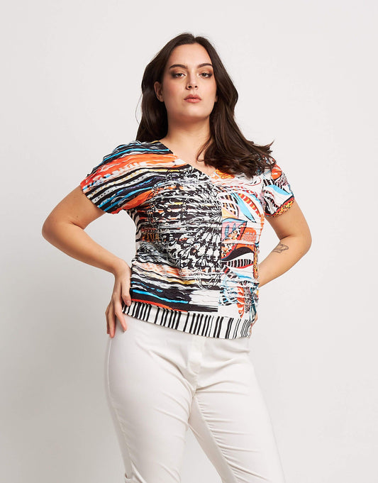 Casacca stampata con volants e bordo curvy