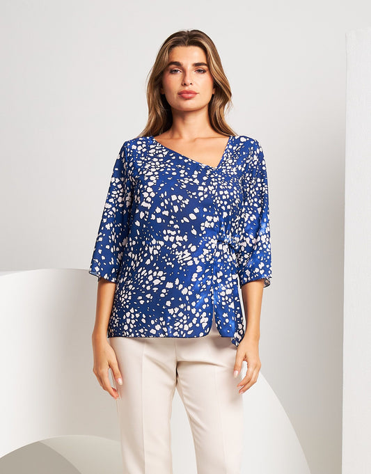 Casacchina fantasia con scollo asimmetrico