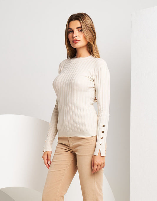 Dolcevita basico con bottoni ai polsi