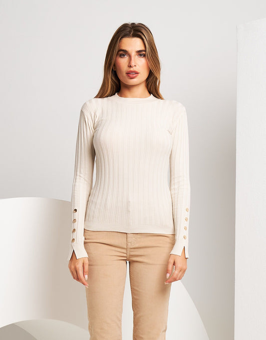 Dolcevita basico con bottoni ai polsi