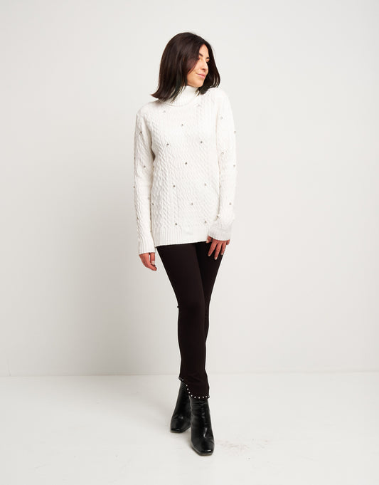 Dolcevita con trecce e diamanti