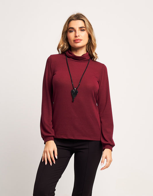 Dolcevita in maglia con maniche a sbuffo