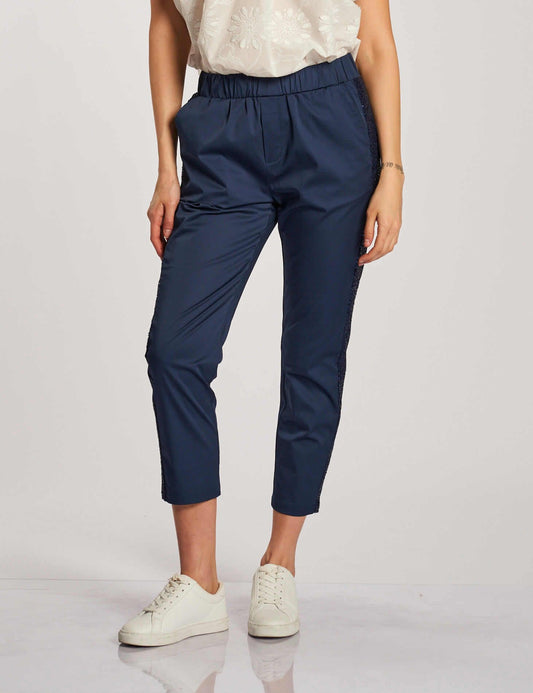 Pantalone con banda in paillettes