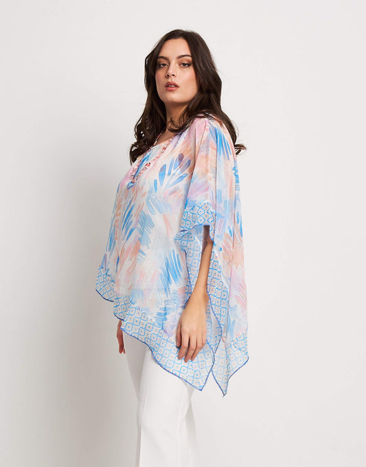 Poncho asimmetrico con top e paillettes curvy