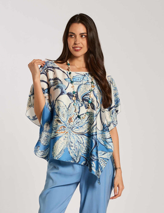 Poncho asimmetrico fantasia con punta