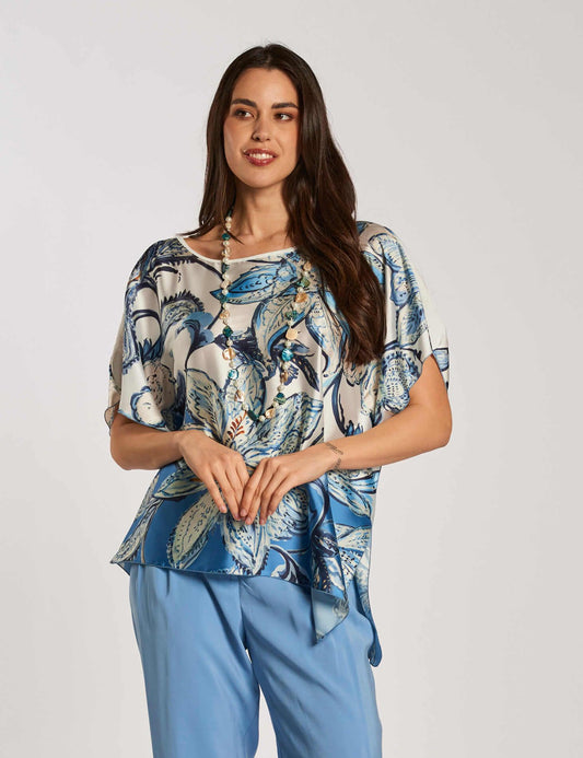 Poncho asimmetrico fantasia con punta