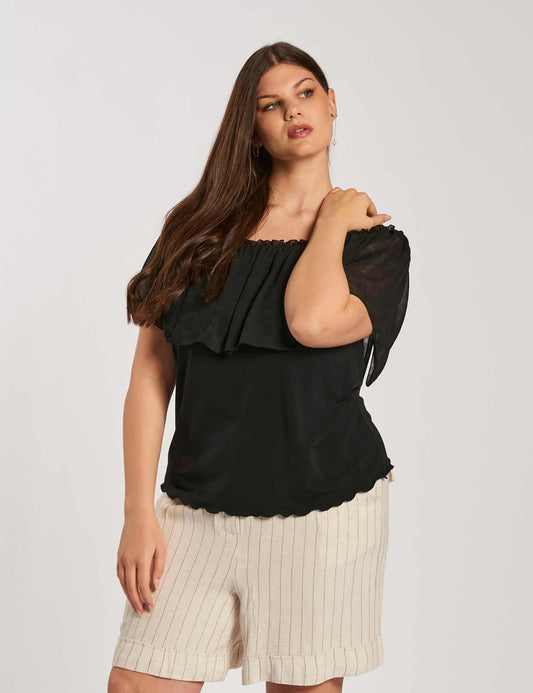 Top con volant a pois curvy