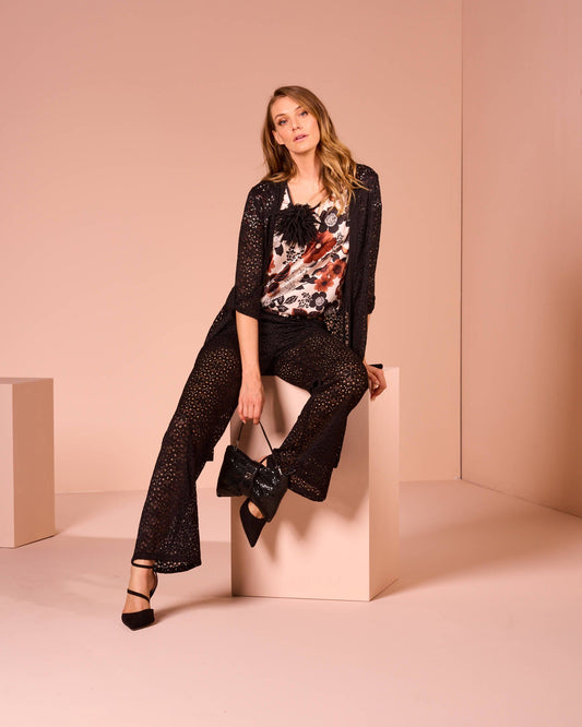 Top fantasia con elastico e riporti