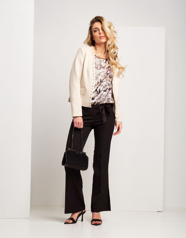 Pantalone con zip e spacchi