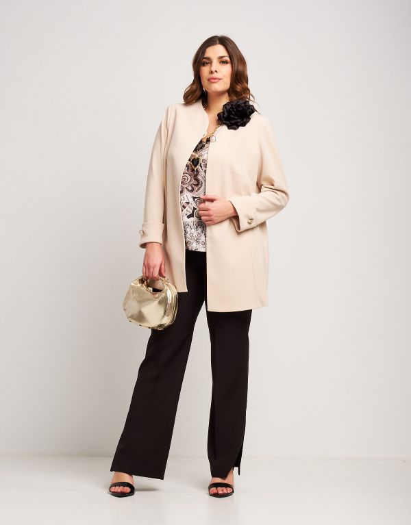 Pantalone con zip e spacchi