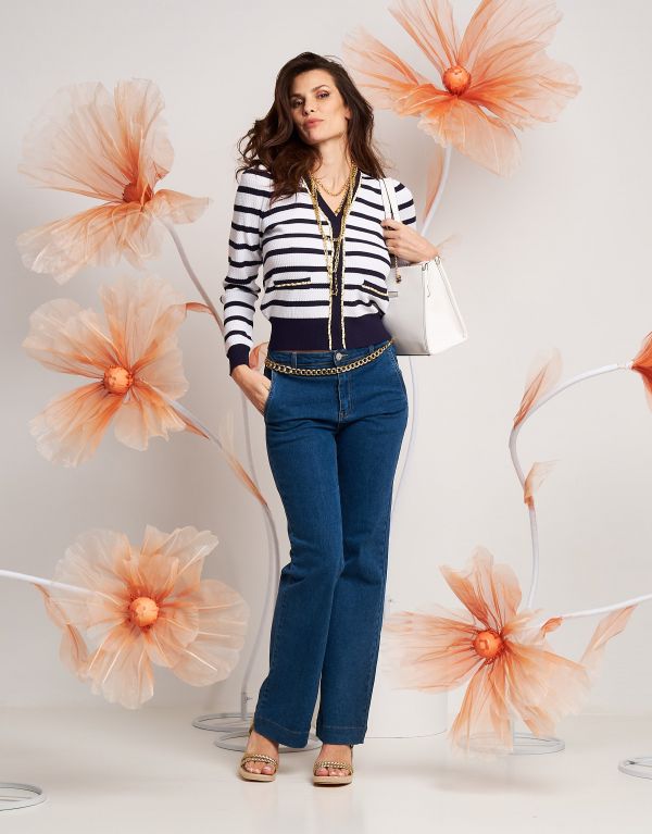 Jeans largo con tasche