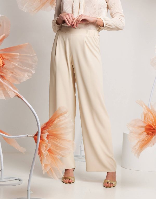 Pantalone largo con elastico
