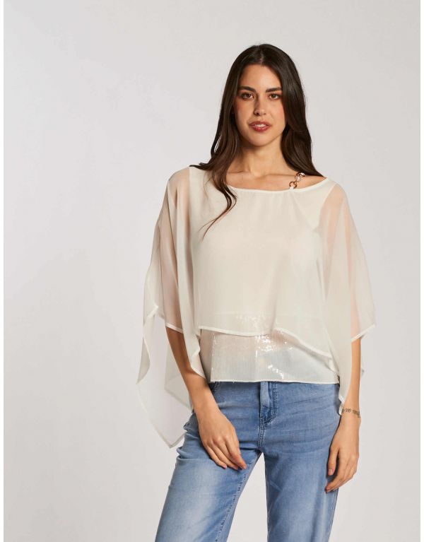 Poncho con accessorio e...