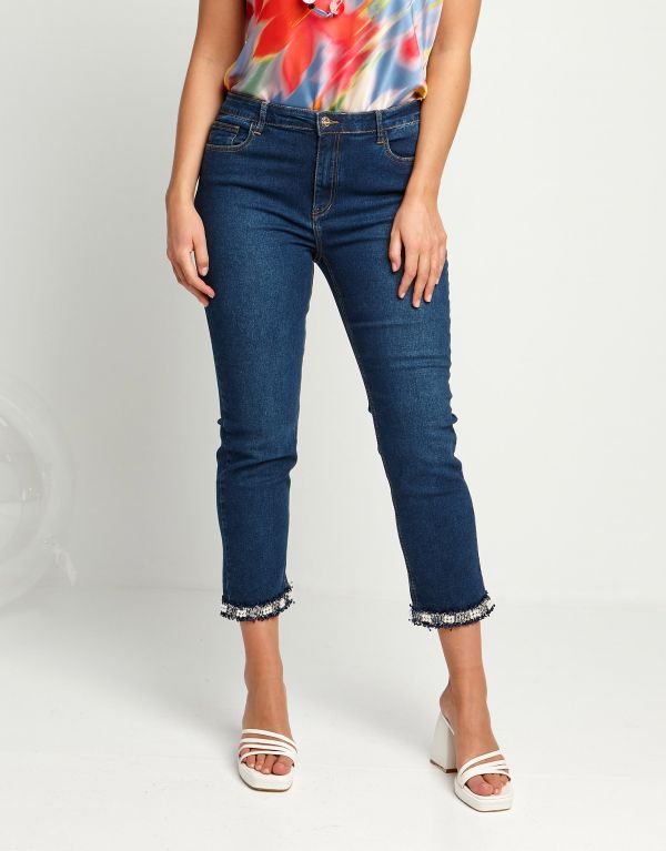 Jeans con spacco e bordura