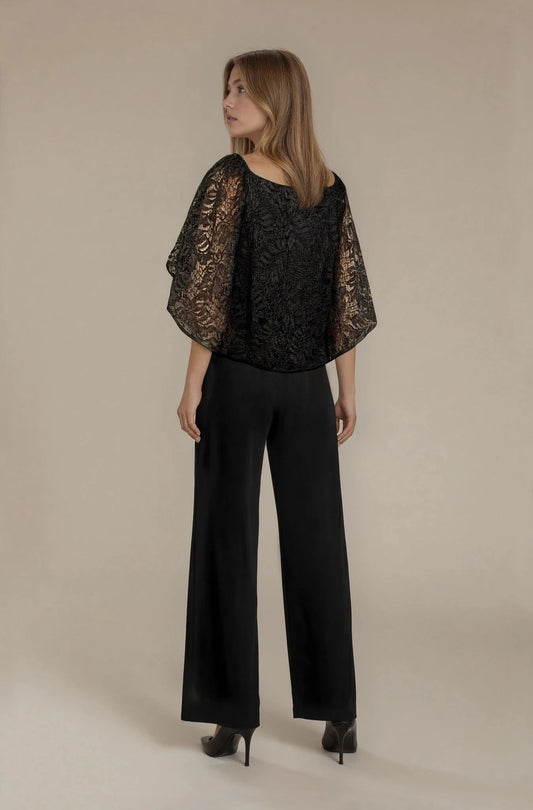 Tuta con mantellina e accessorio