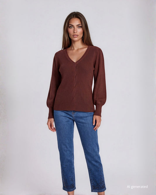 Maglia in filato di micropaillettes con treccia sul fronte e coste moka
