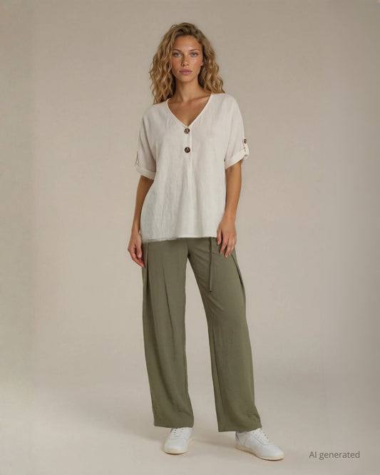 Camicia in cotone con bottoni sullo scollo e risvolto sulle maniche bianco