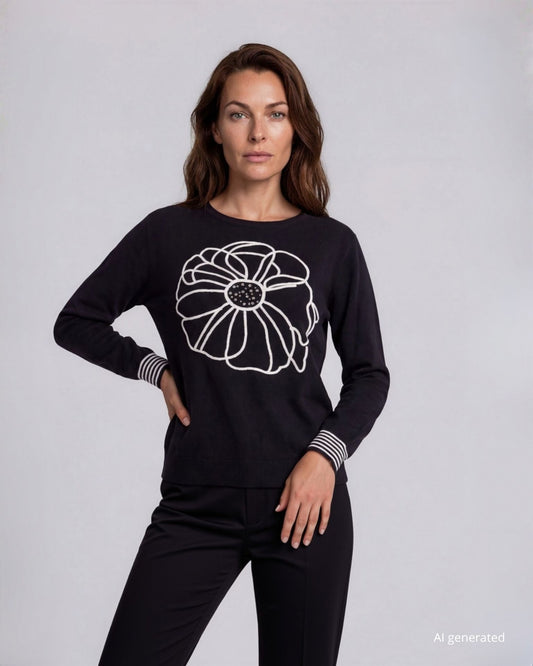 Maglia a pipistrello con fiore ricamato e bordi a contrasto
