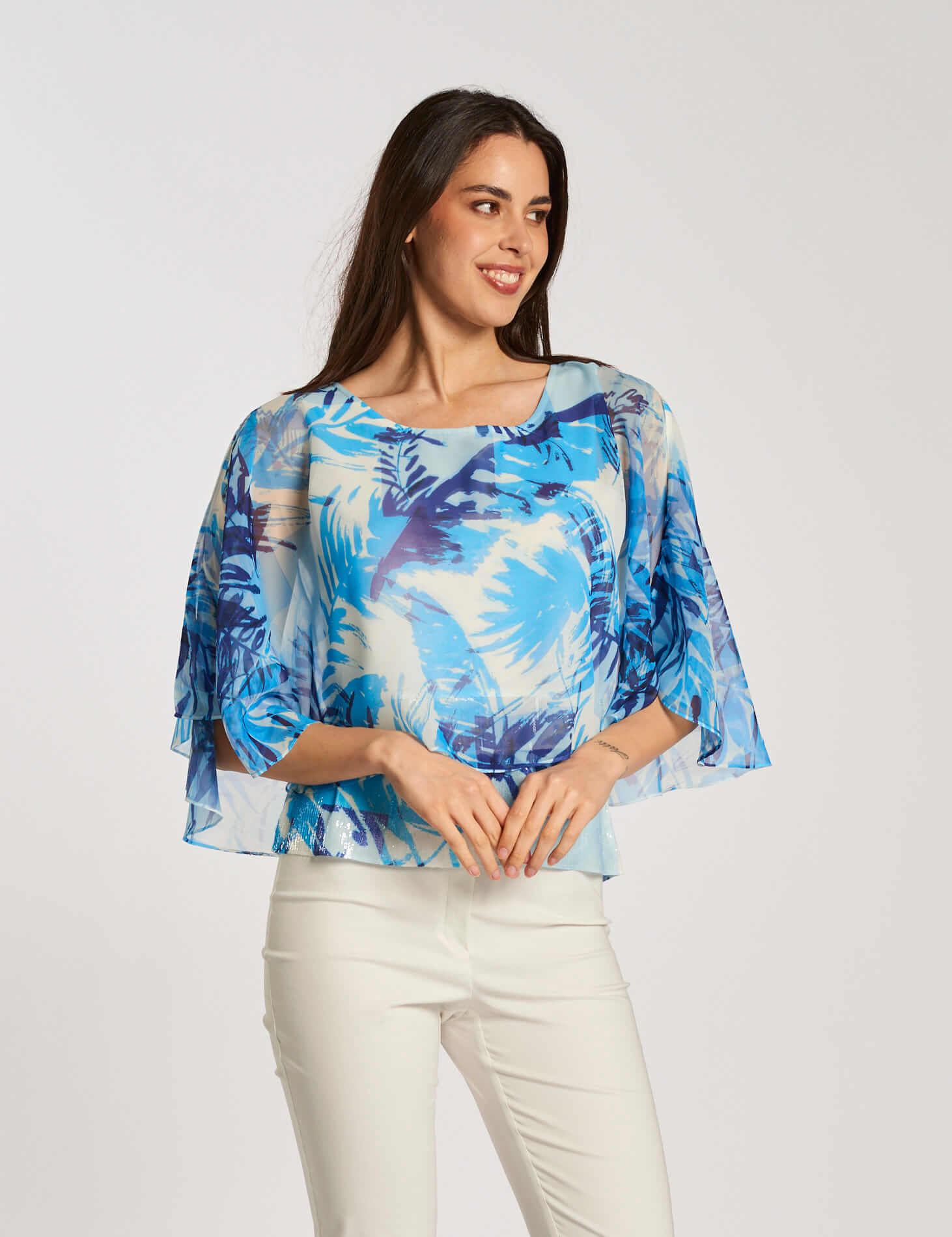 Poncho in georgette con stampa e paillettes