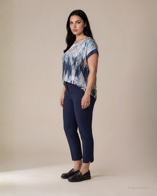 Maglia a scatola fantasia blu con dettagli in lamina dorata e paillettes sulle maniche