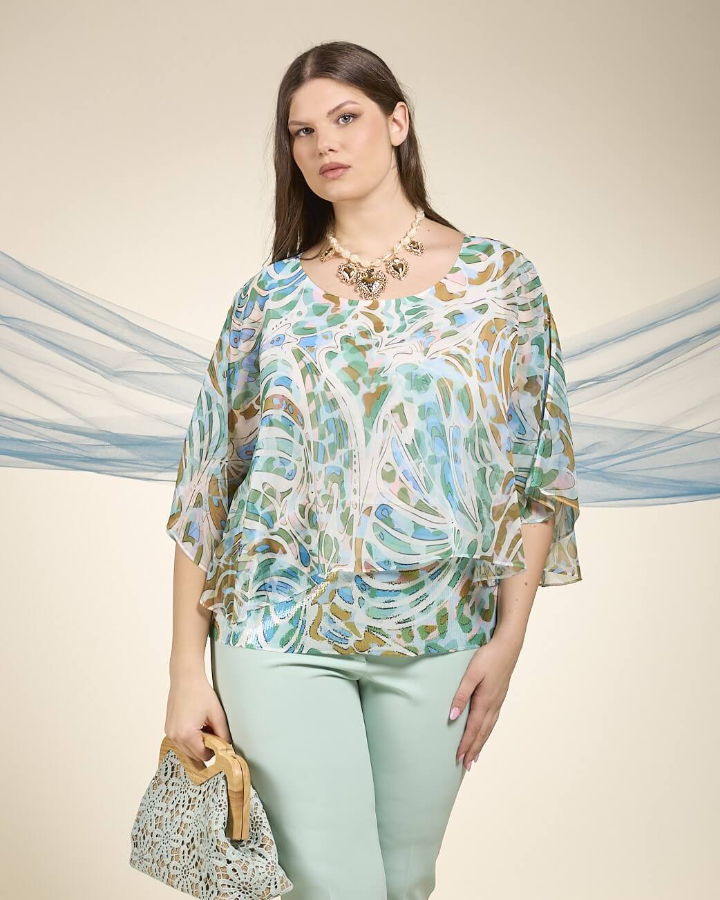 Poncho fantasia con fondo in paillettes curvy