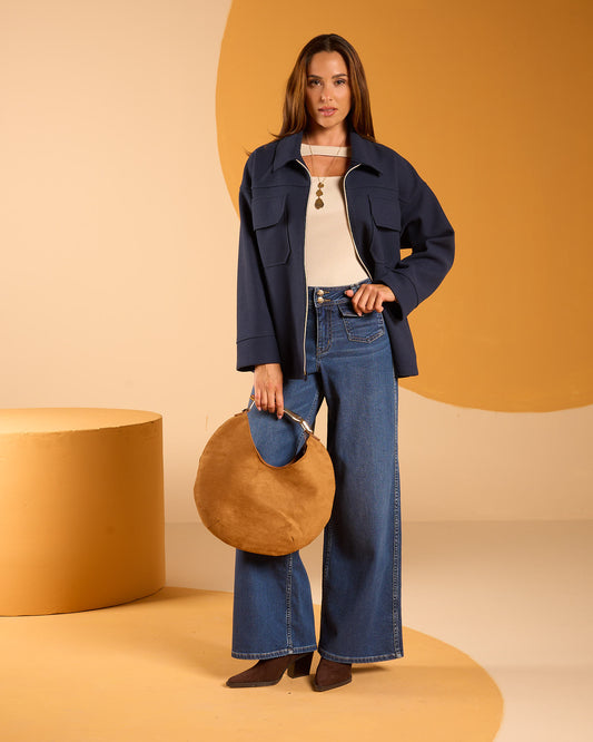 Jeans largo con taschine frontali e cinturone con bottoni