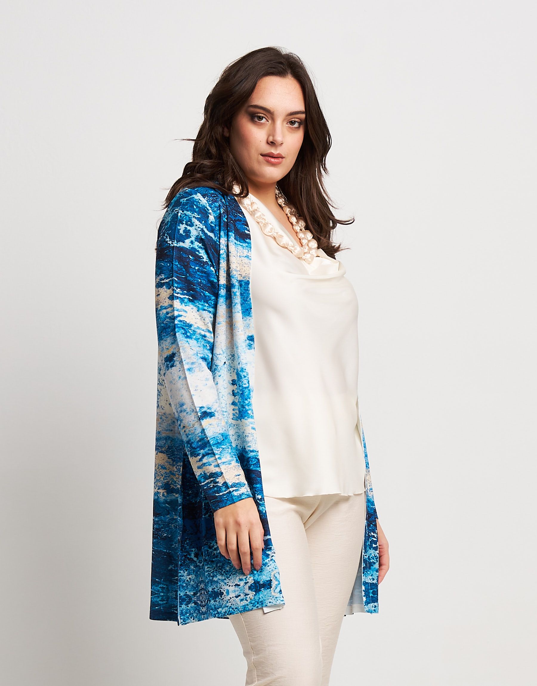 Caban in maglia con tasche curvy
