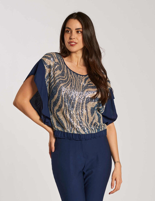 Casacca a ponchetto con elastico e paillettes