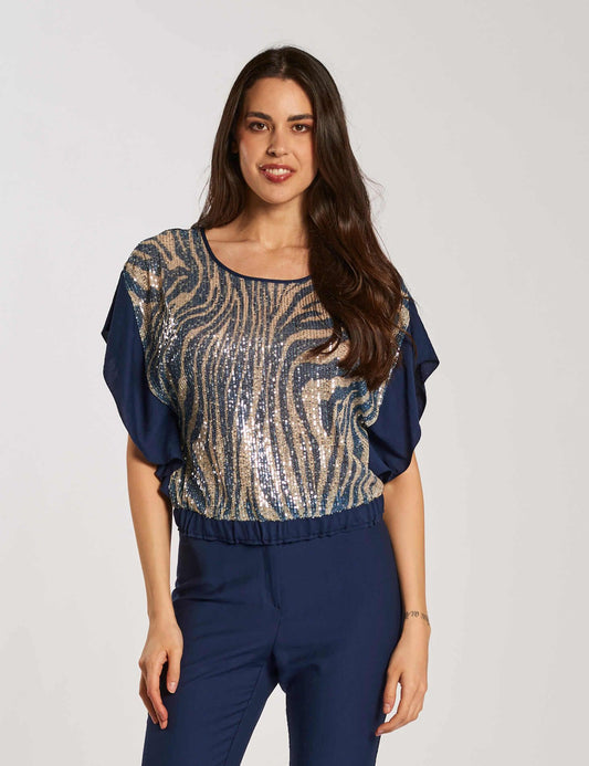 Casacca a ponchetto con elastico e paillettes