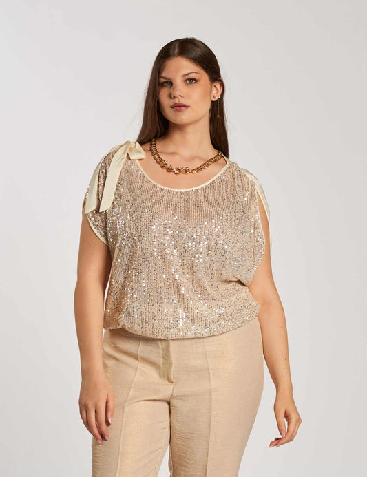 Casacca asimmetrica con paillettes e fiocco curvy