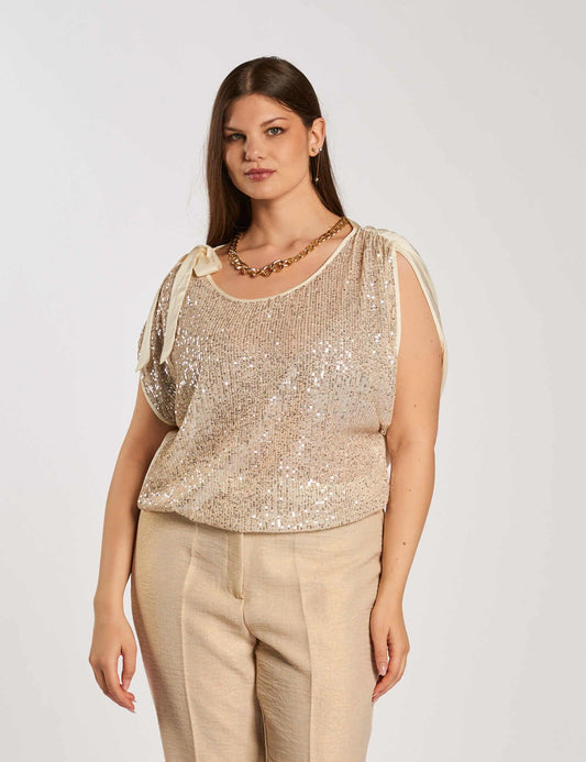 Casacca asimmetrica con paillettes e fiocco curvy