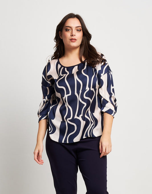 Casacca con spalla scesa e bordi curvy