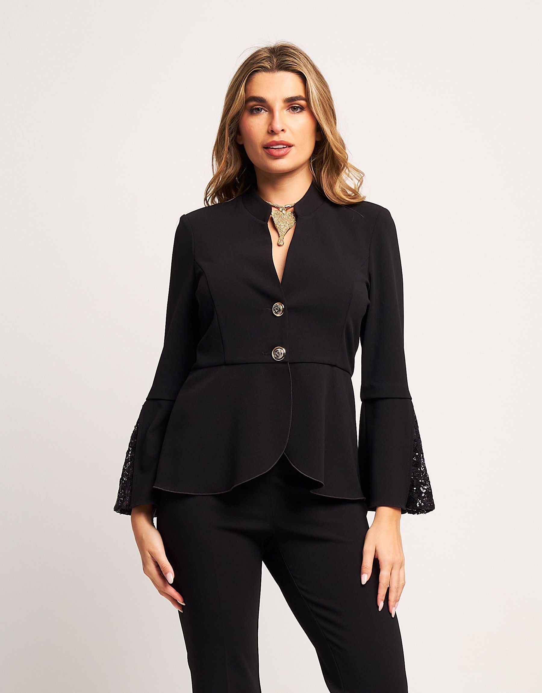 Giacca con inserti in pizzo e paillettes