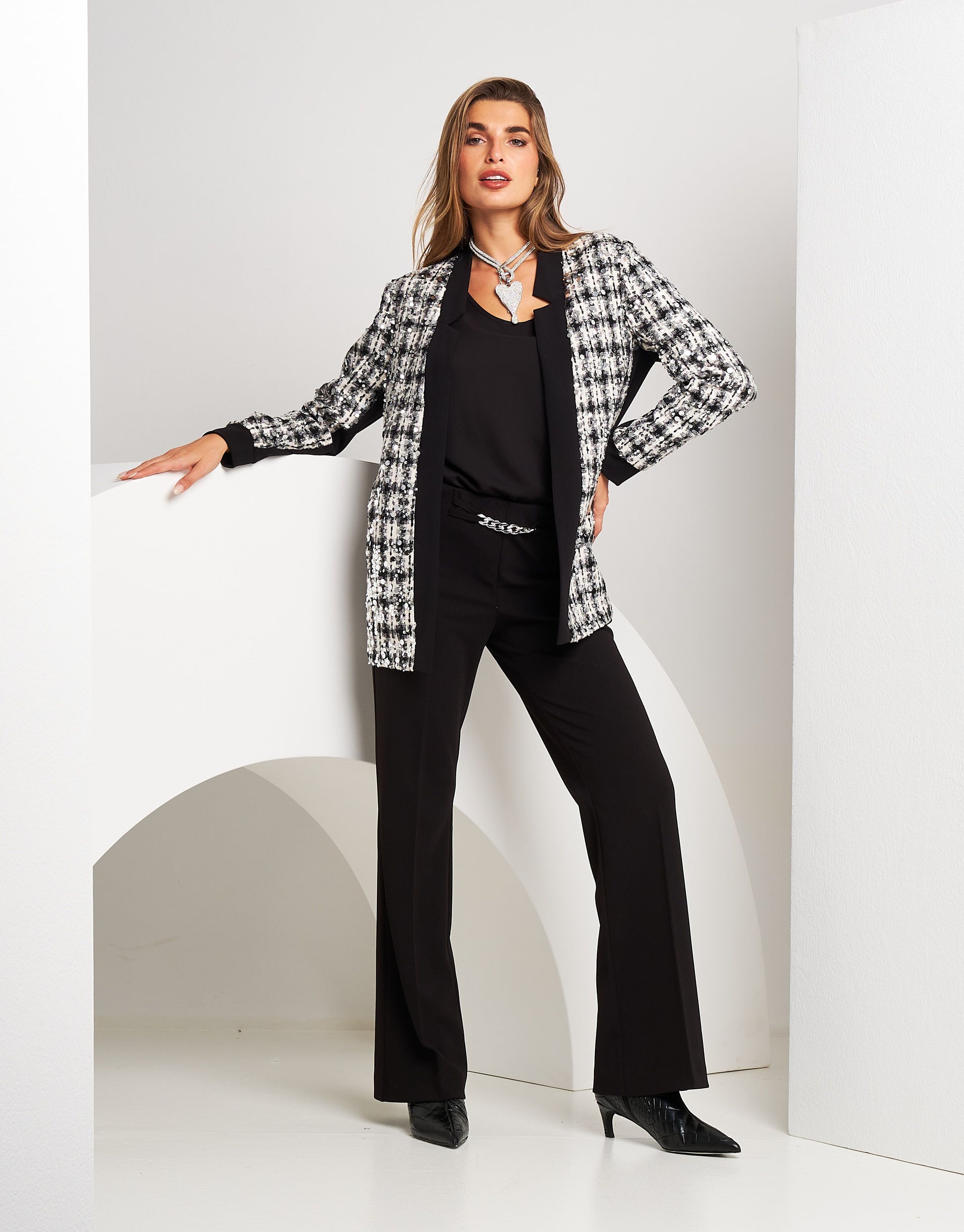 Giacca lunga bouclé con paillettes