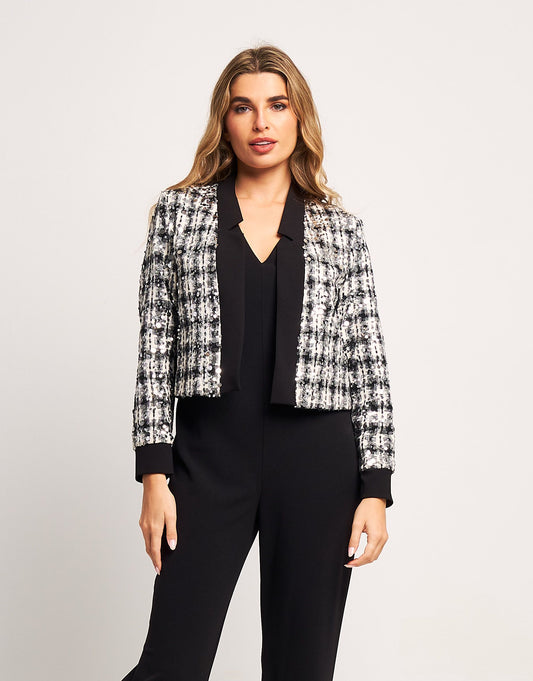 Giacchino corto bouclé con paillettes e riporti