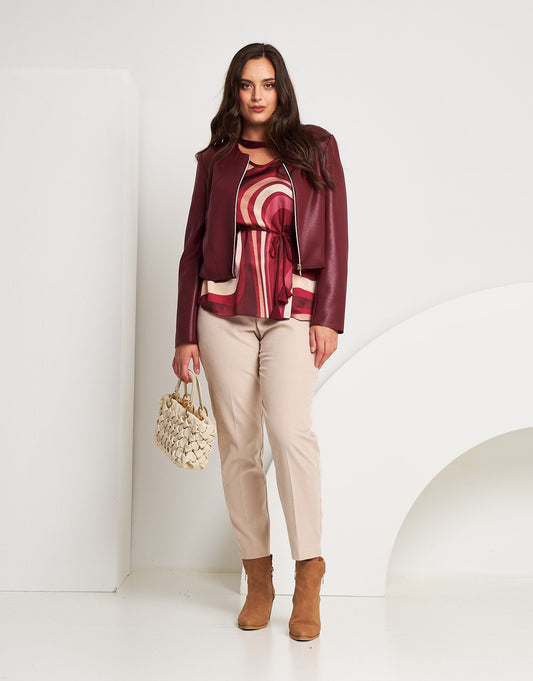 Giubbino in ecopelle con zip curvy