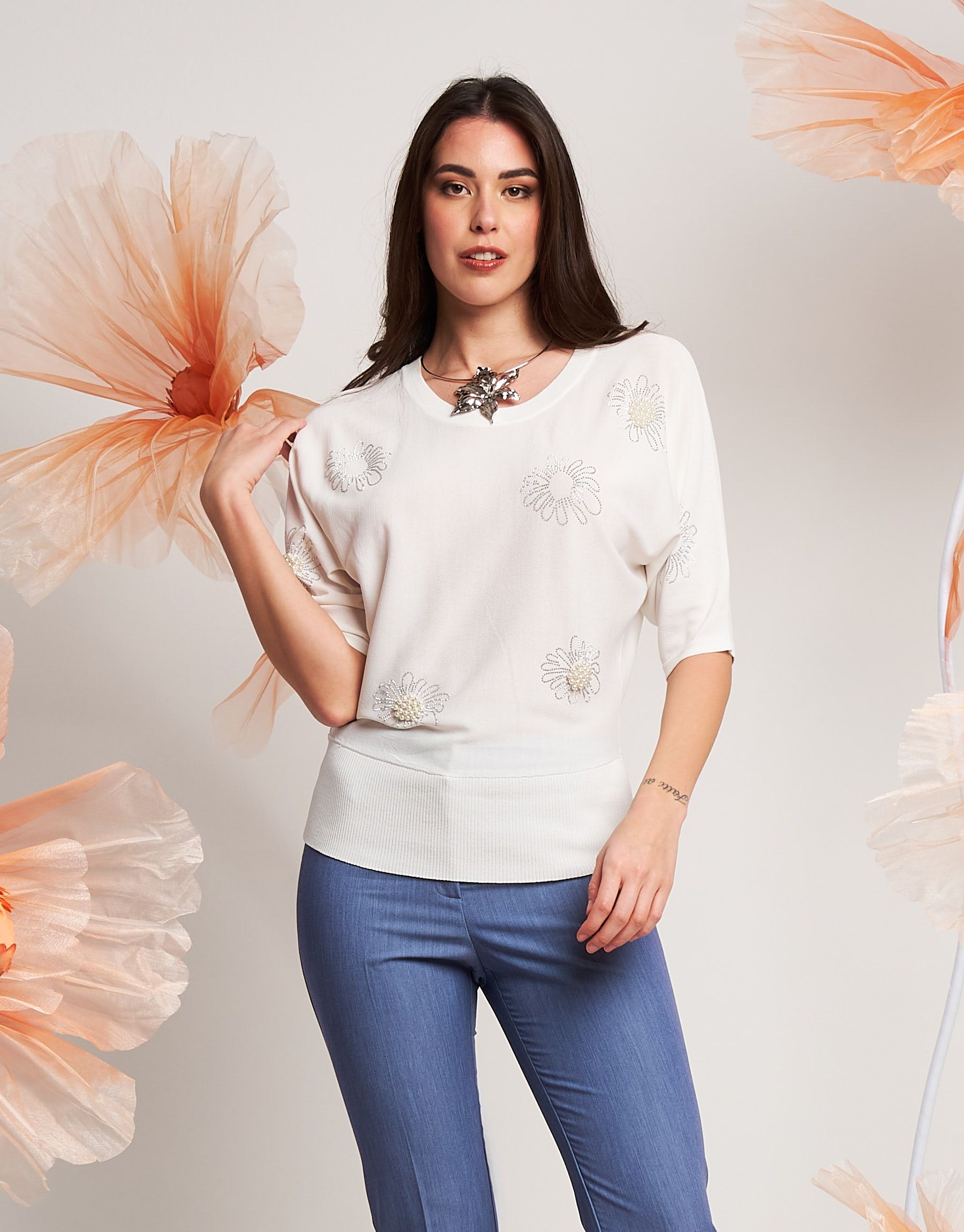 Maglia a pipistrello con applicazioni