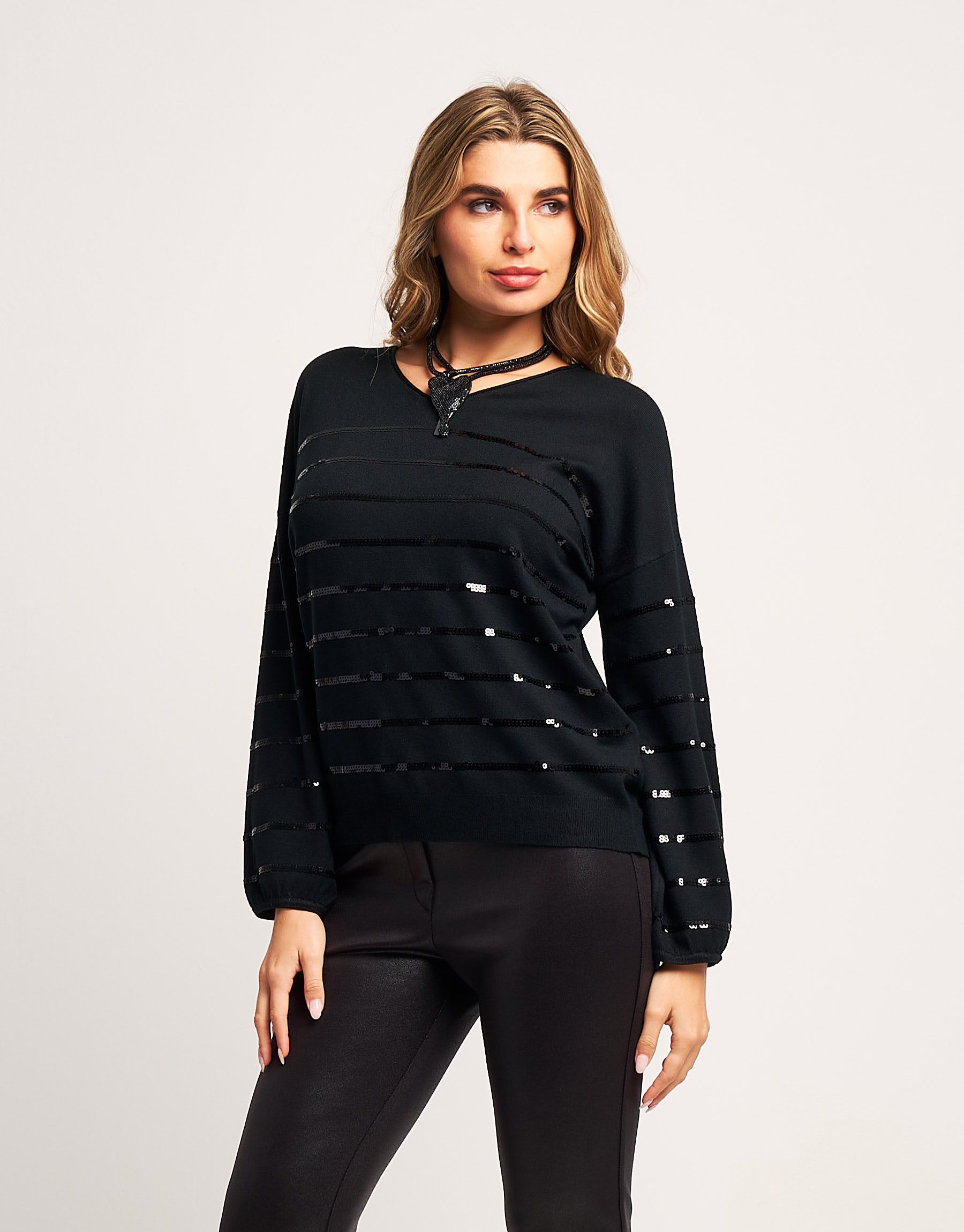 Maglia con maniche a palloncino e paillettes