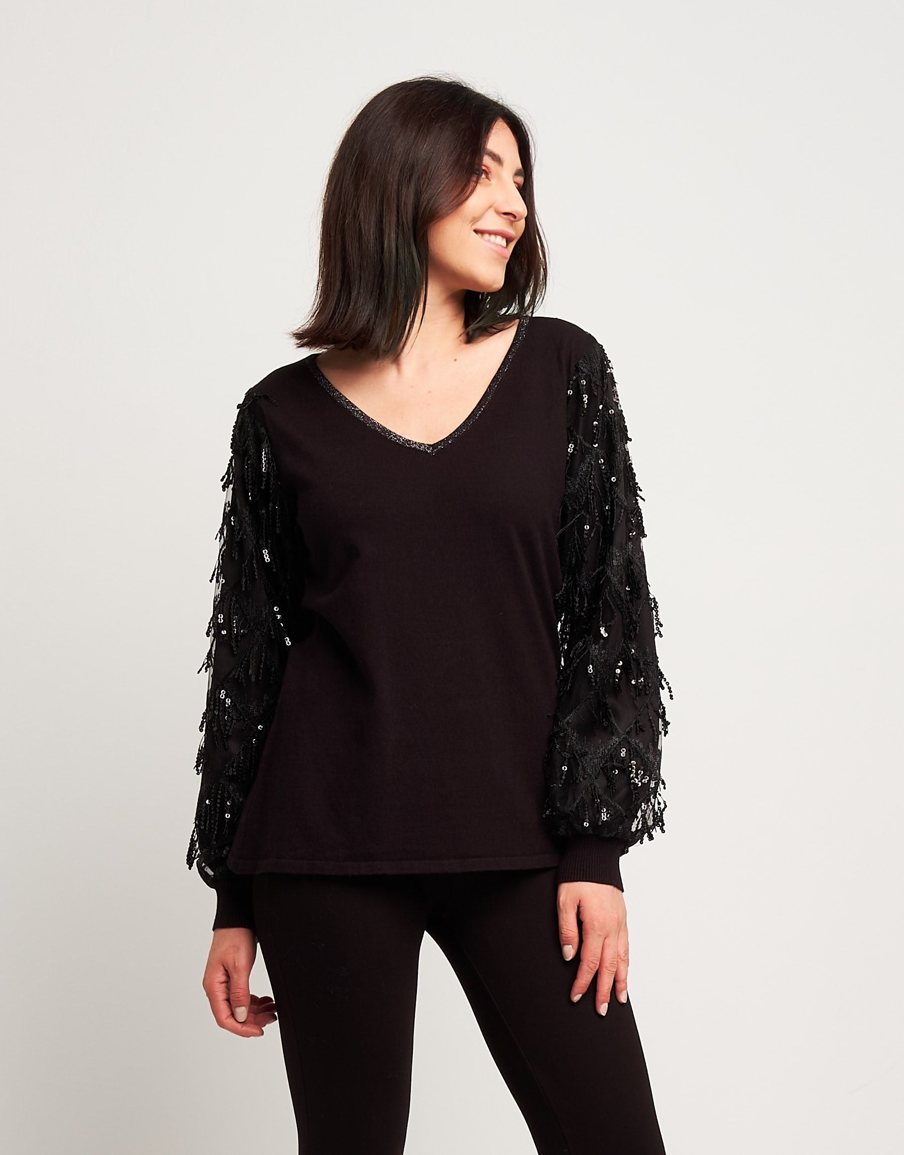 Maglia con maniche ampie in paillettes