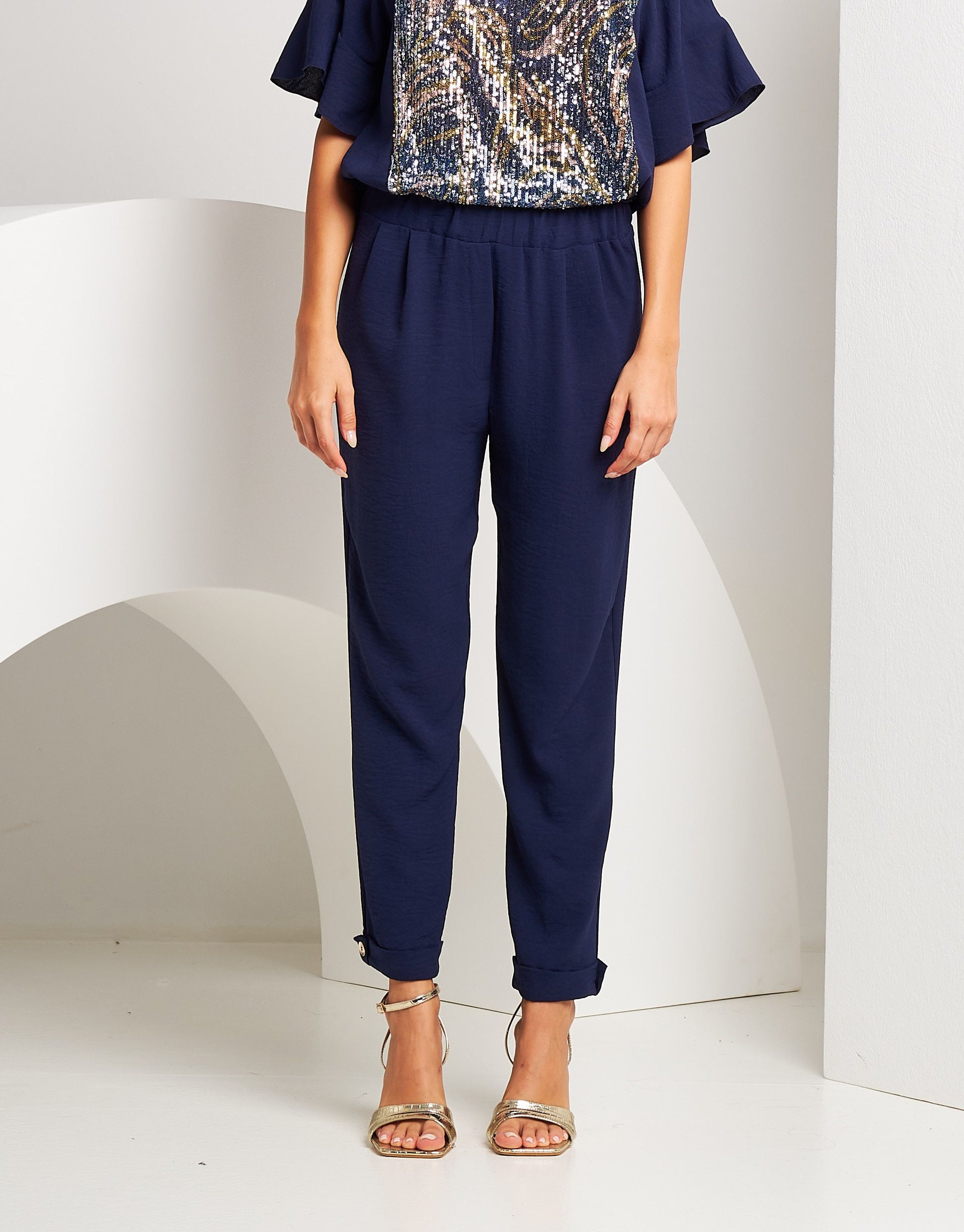 Pantafitness con risvolto e bottoncini