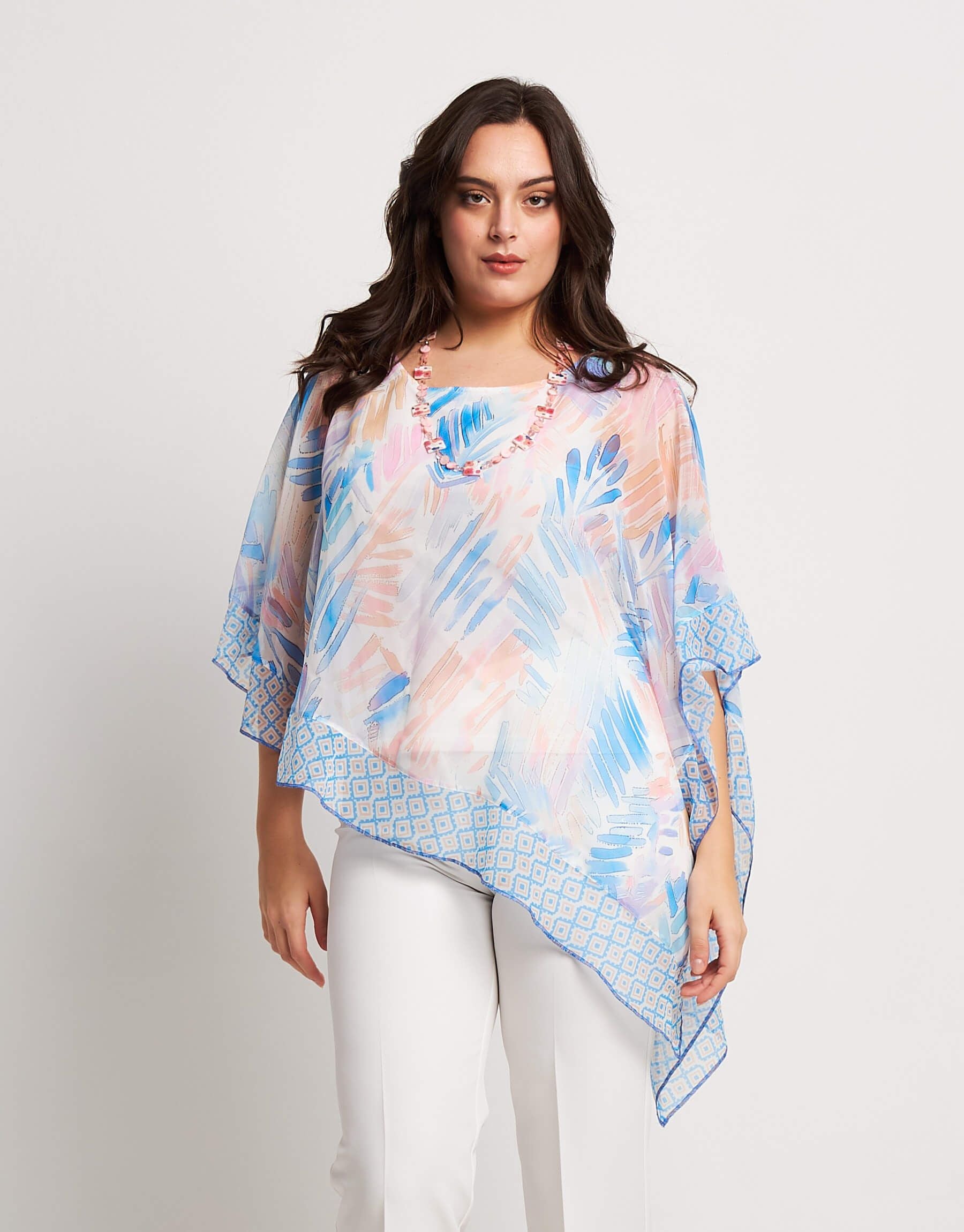 Poncho asimmetrico con top e paillettes curvy