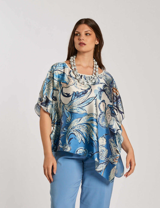 Poncho fantasia asimmetrico con punta curvy