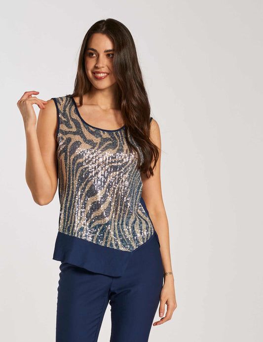 Top con volant e fronte di paillettes